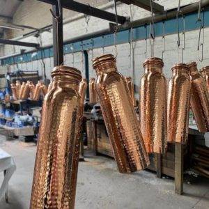 copper items being coated